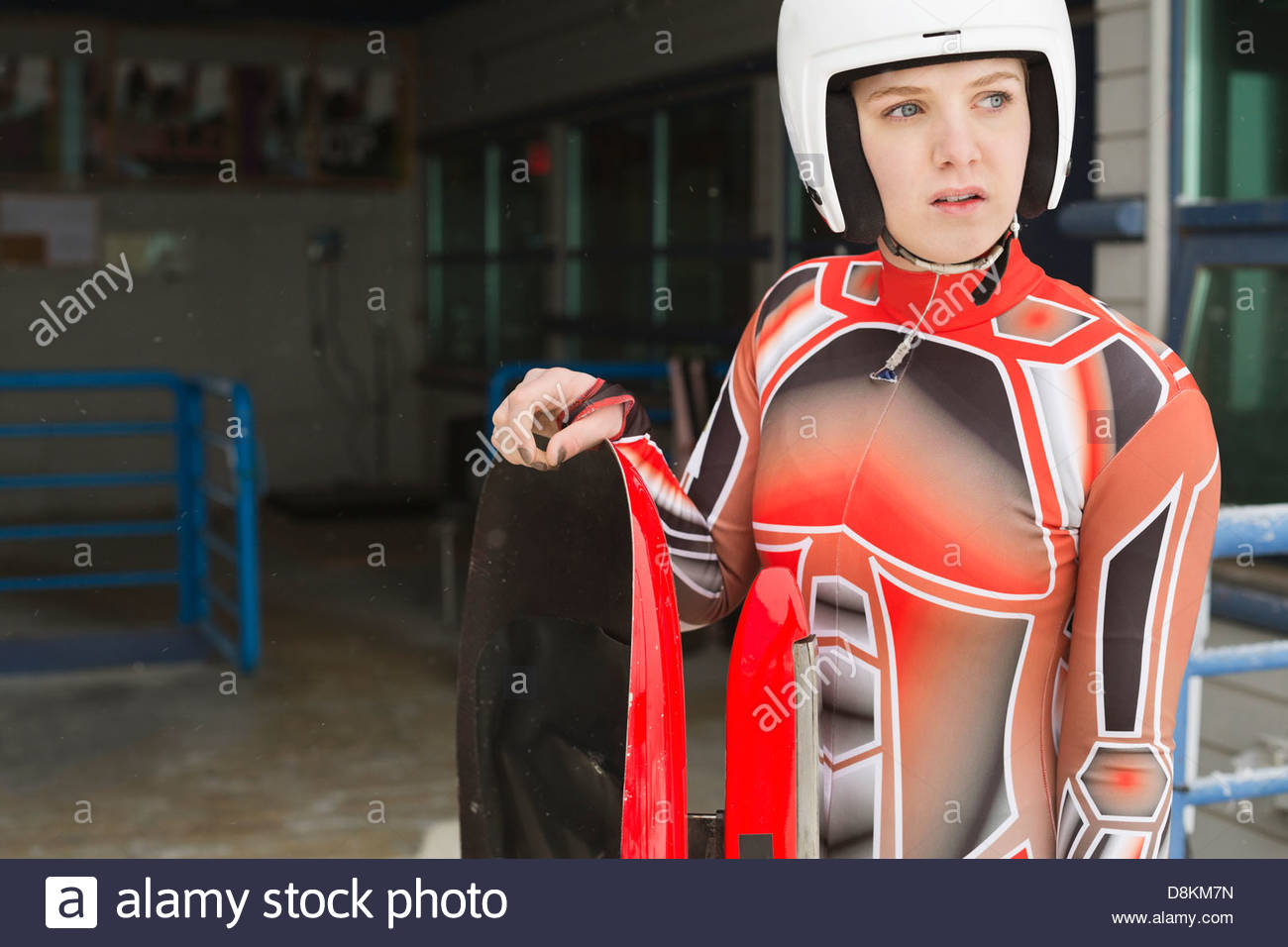 Female luge athlete preparing for race Stock Photo