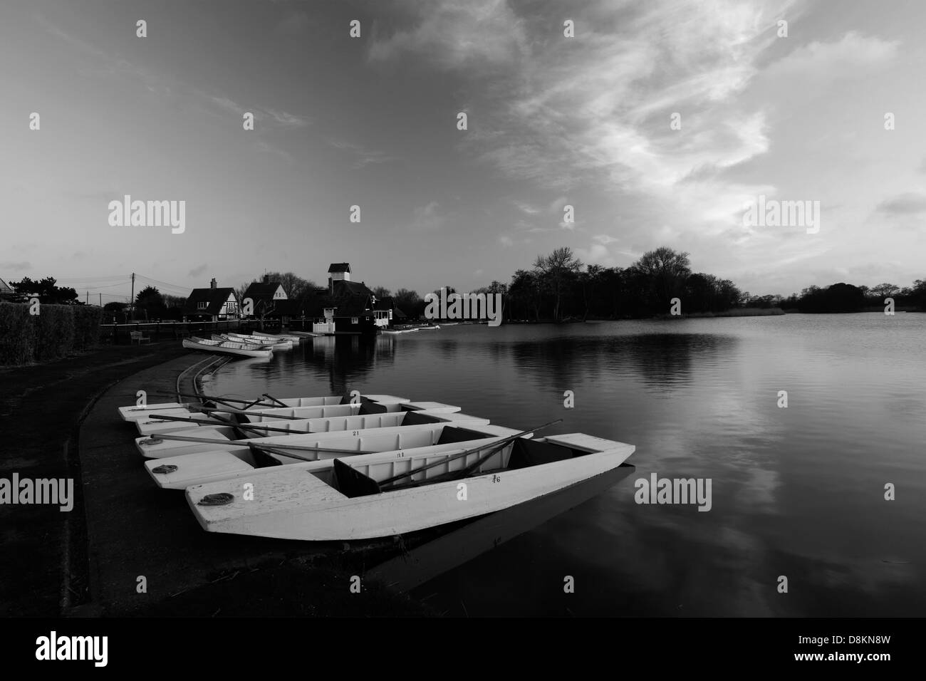 Colourful wooden rowing boats for hire on the Mere lake, Thorpeness