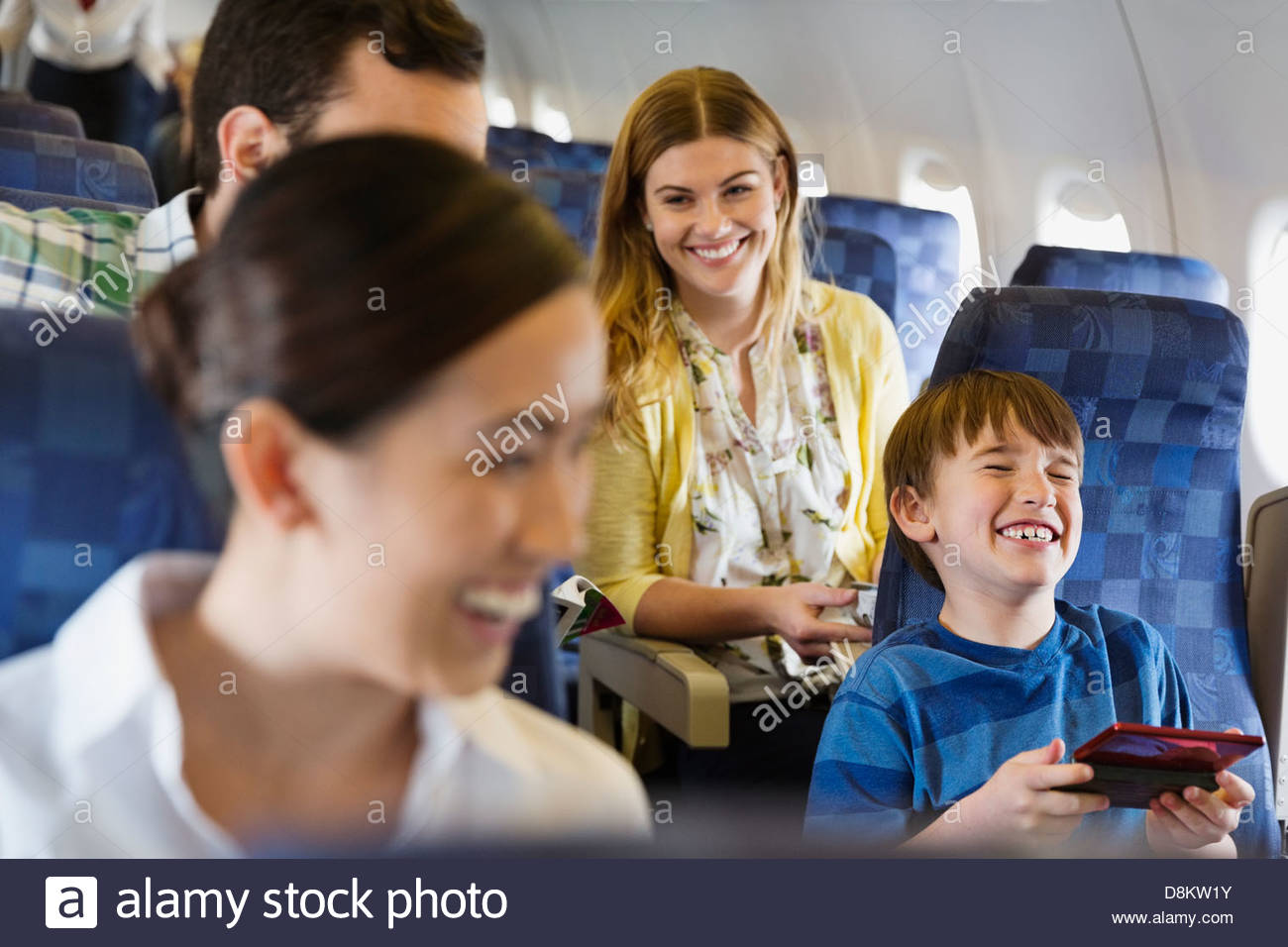 Airplane passengers economy class hi-res stock photography and images ...