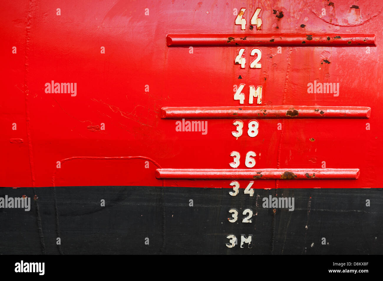 Ship hull with waterline and draft scale measure Stock Photo