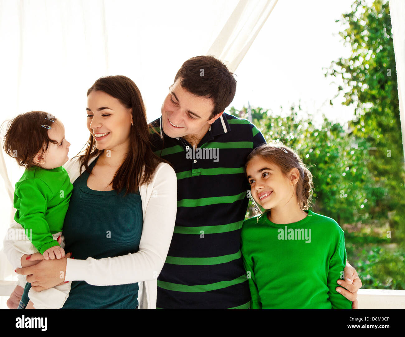 Portrait of a happy smiling family Stock Photo - Alamy