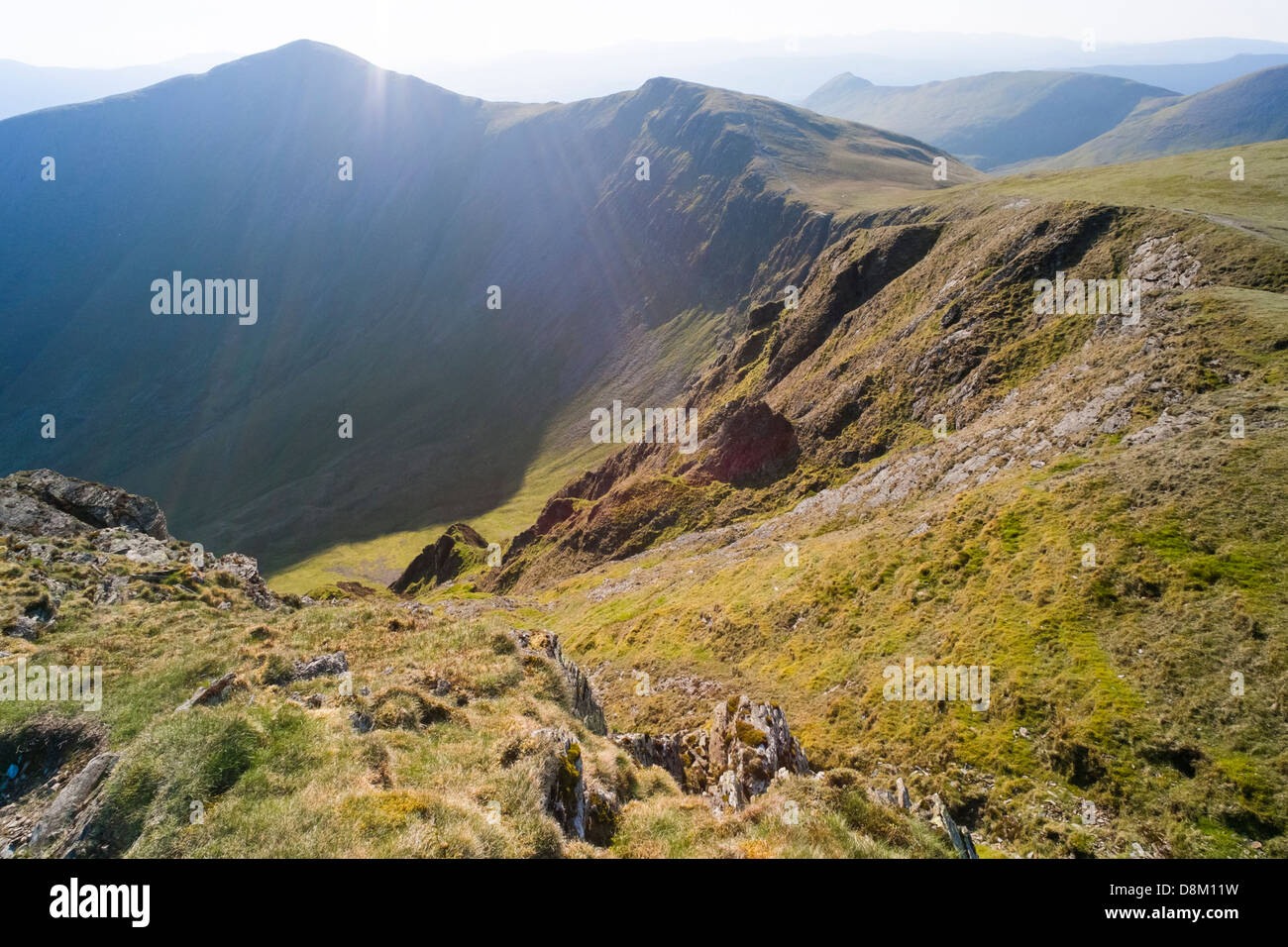Looking towards Grisedale Pike & Hobcarton from the summit of Hopegill Head at sunrise in the Lake District Stock Photo