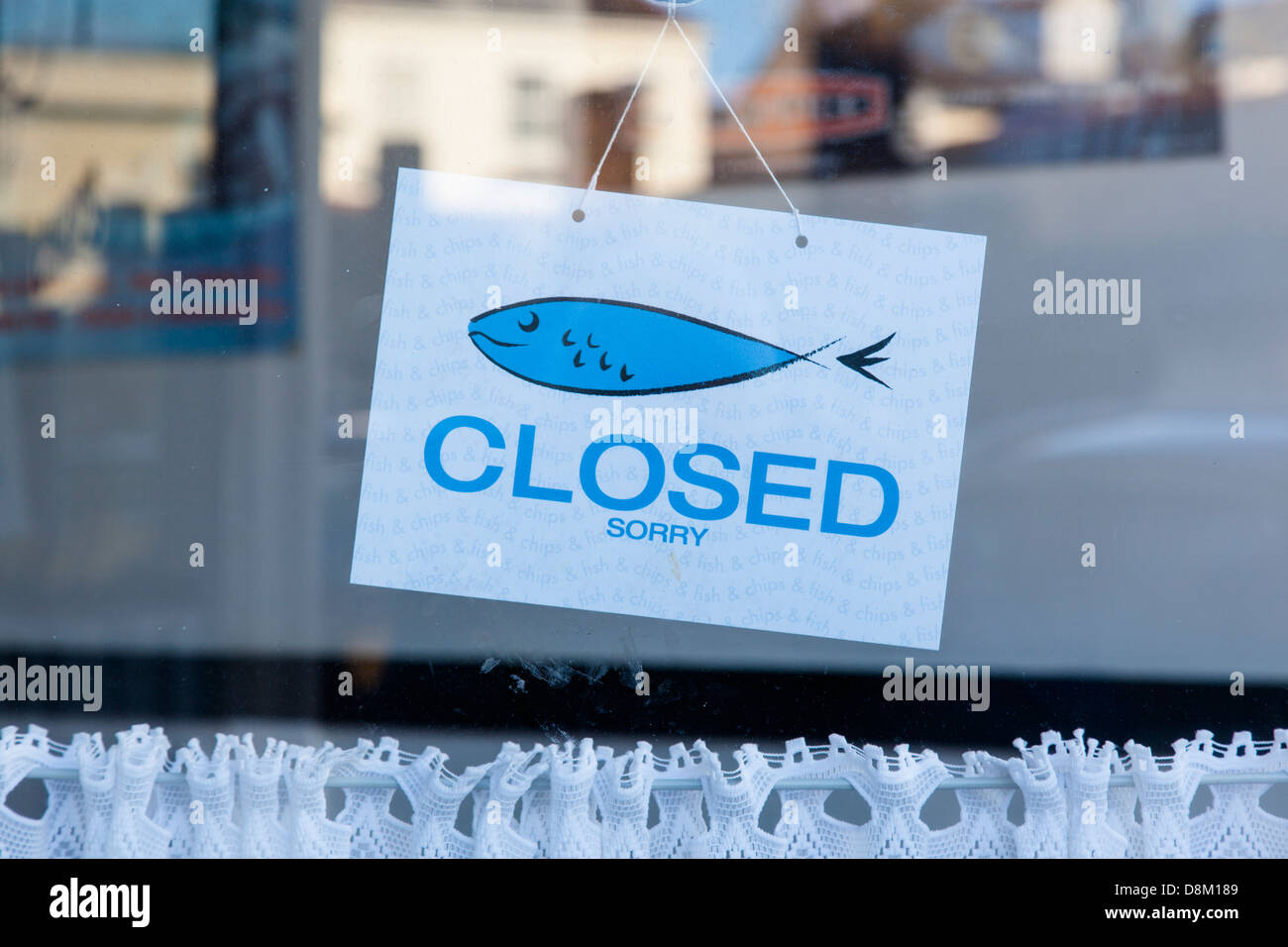 Closed sign in a fish and chip shop window Stock Photo Alamy
