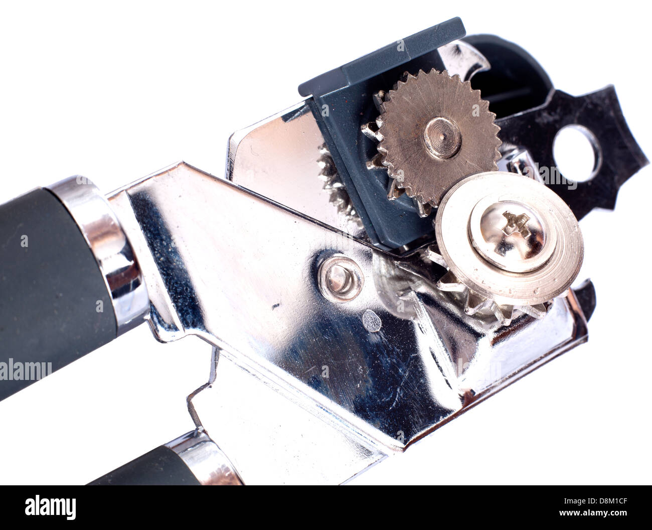 Can opener mechanism close up on a white background Stock Photo - Alamy