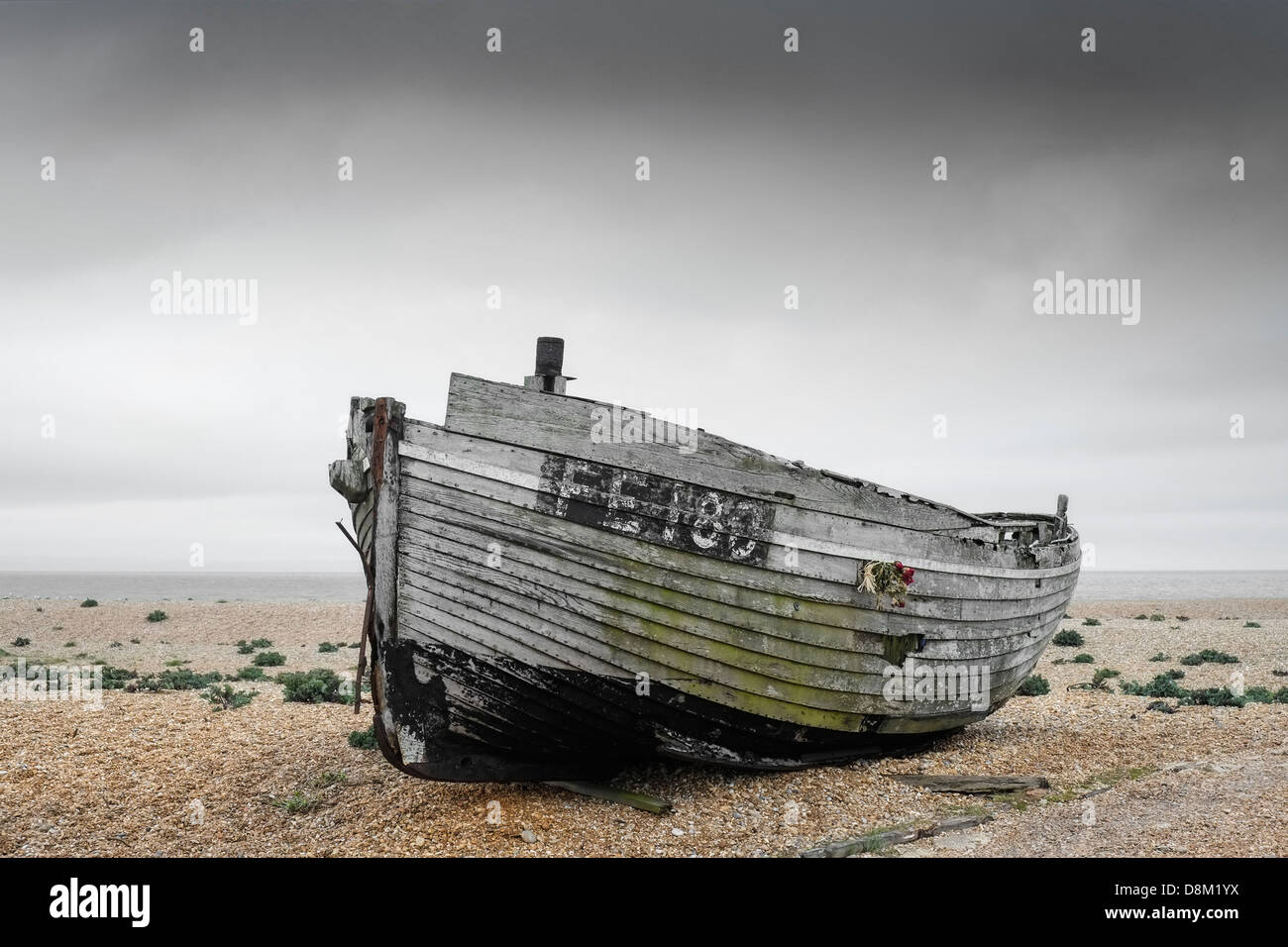 An old abandoned wooden boat beached at Dungeness Stock Photo - Alamy