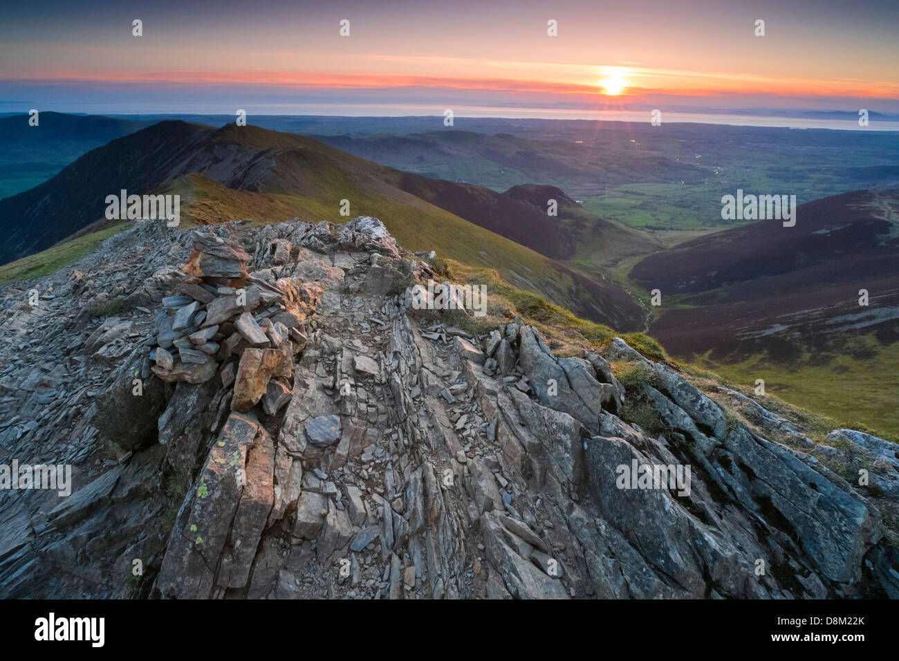 Looking towards Whiteside and Hope Gill from the summit of Hopegill Head at sunset in the Lake District. Stock Photo