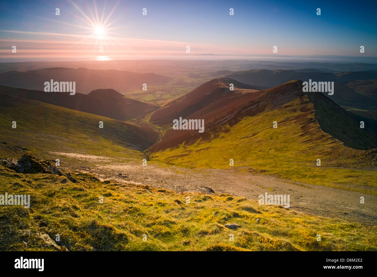 Looking towards Hope Gill and Ladyside Pike from the summit of Hopegill Head at sunset in the Lake District Stock Photo