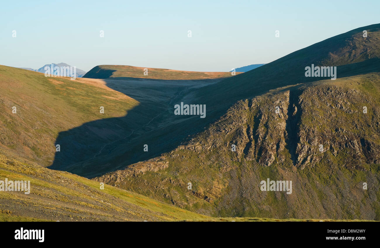 Looking towards Coledale Hause and Grasmoor from the summit of Hopegill Head at sunset in the Lake District Stock Photo