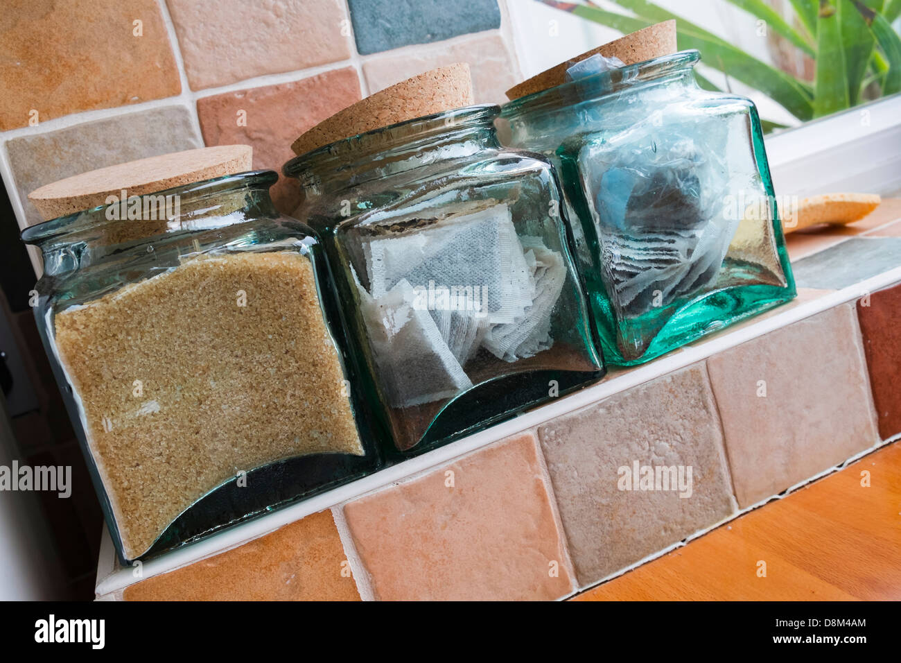Sugar, tea and coffee containers in a kitchen Stock Photo Alamy
