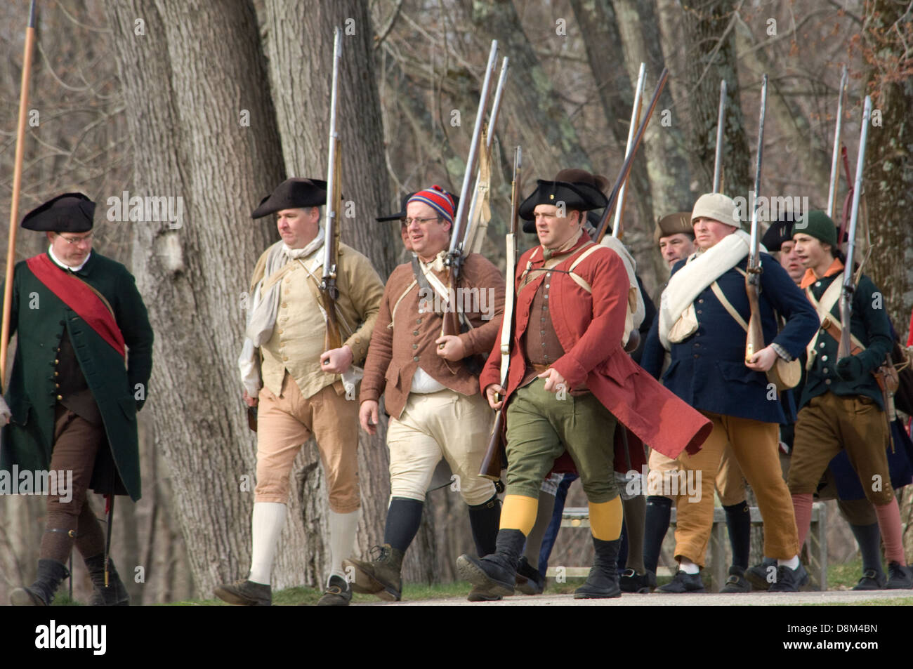 Minutemen reenactors marching to battle the British at the Battle of Concord, Minuteman National Historical Park, Concord MA. Digital photograph Stock Photo