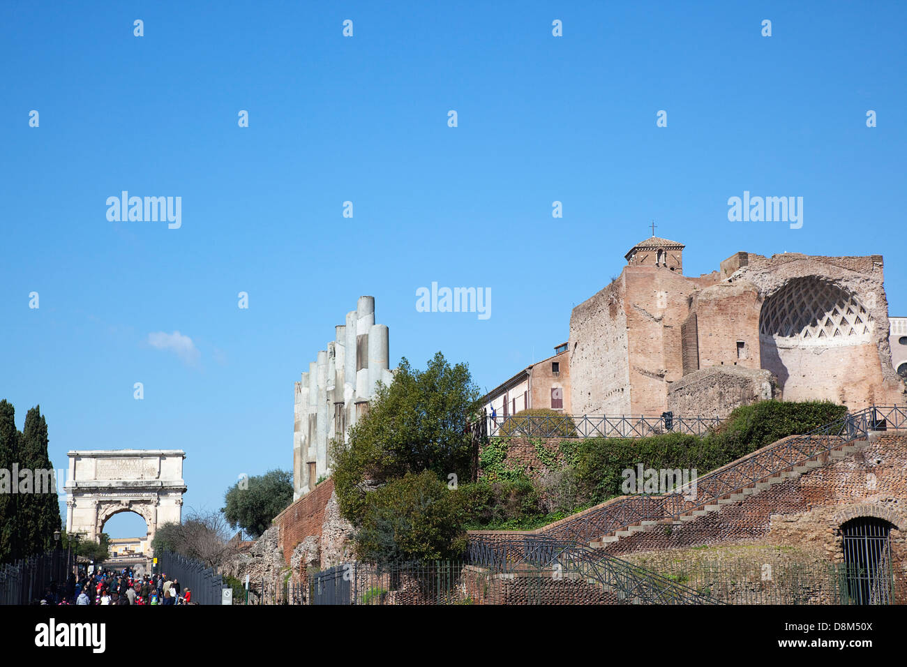 Italy, Lazio, Rome, tourists walking up Via Sacra toward the Arch of