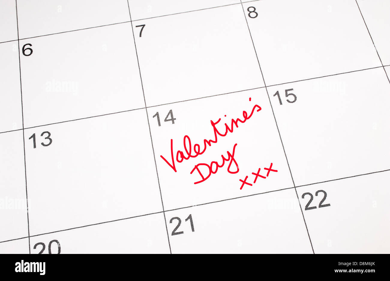Calendar page showing the date of Saint Valentine's Day,the 14th February with Valentine's Day written in red ink Stock Photo