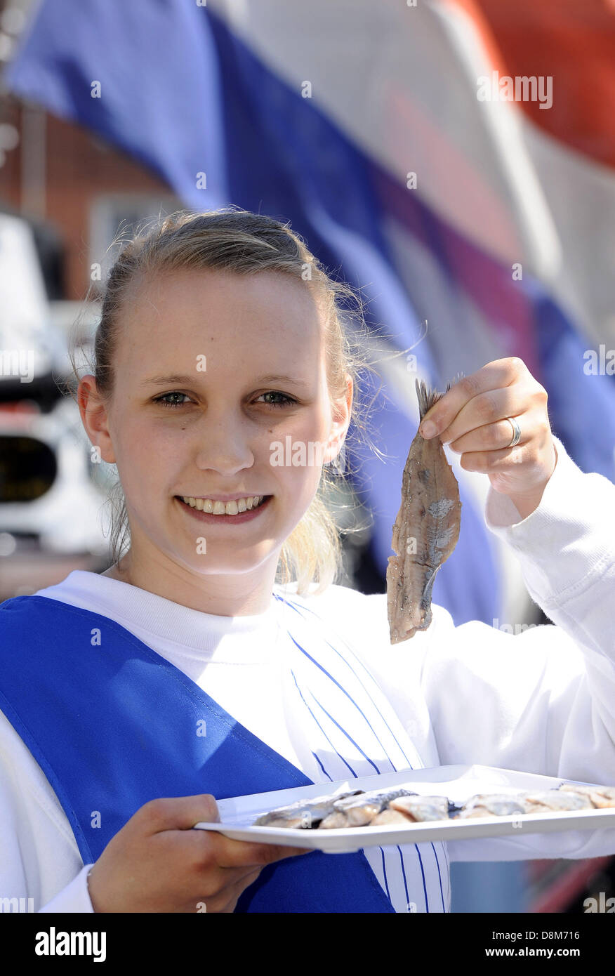 Hanna Hoelscher poses with Dutch matjes at the Emder Matjes Days at the