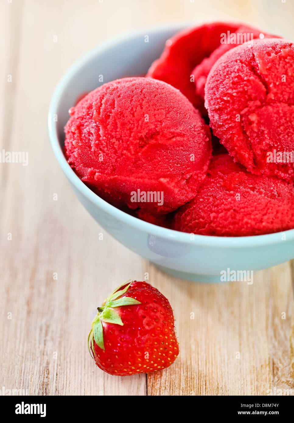 Strawberry ice cream in blue bowl Stock Photo Alamy