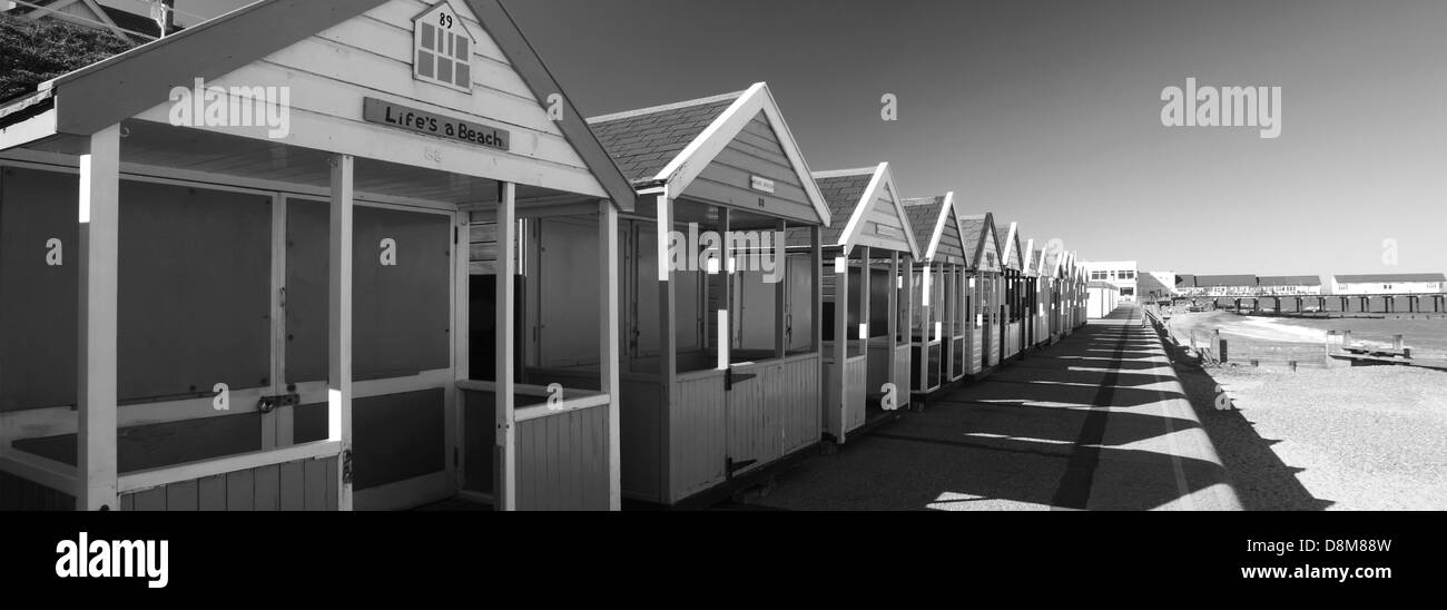 Colourful wooden Beach huts on the promenade, Southwold town, Suffolk County, England, United Kingdom Stock Photo