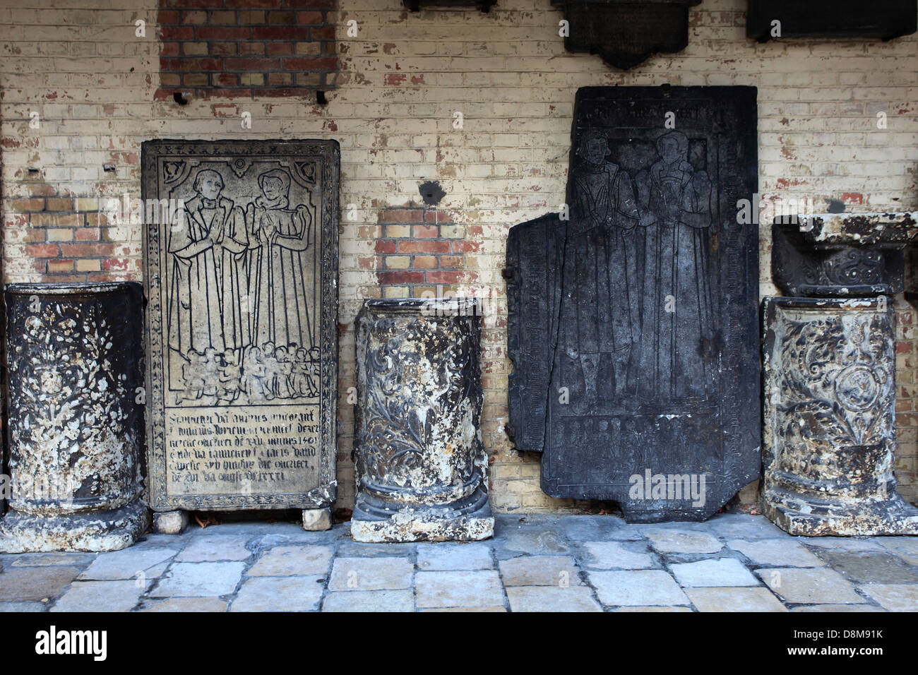 Mediaeval stone tablets at the Gruuthuse Museum, Bruges City; West Flanders in the Flemish Region of Belgium. Stock Photo