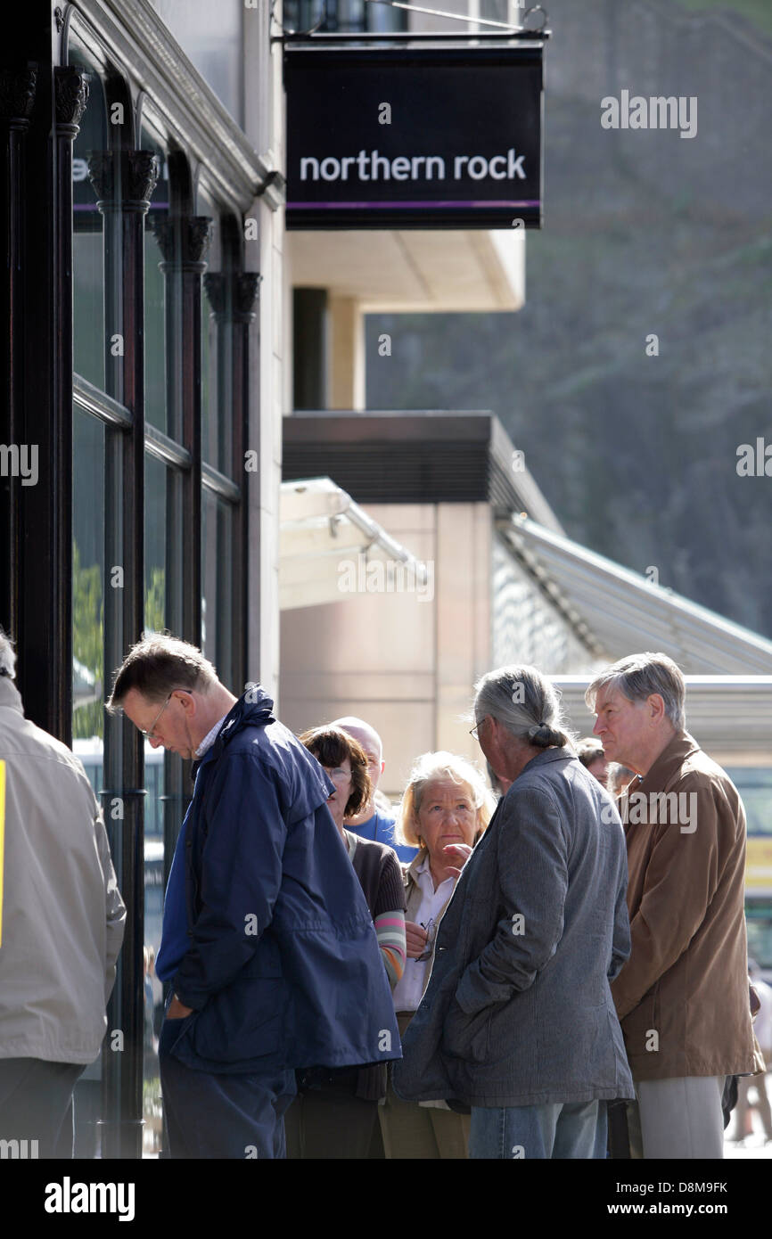 Customers queue at the Northern Rock branch HQ in Edinburgh, following reports of its potential collapse Stock Photo