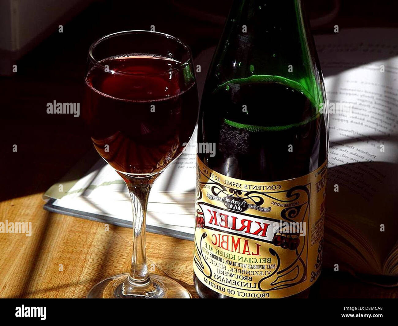A glass of Belgian lambic, a traditional style of beer brewed with wild ...