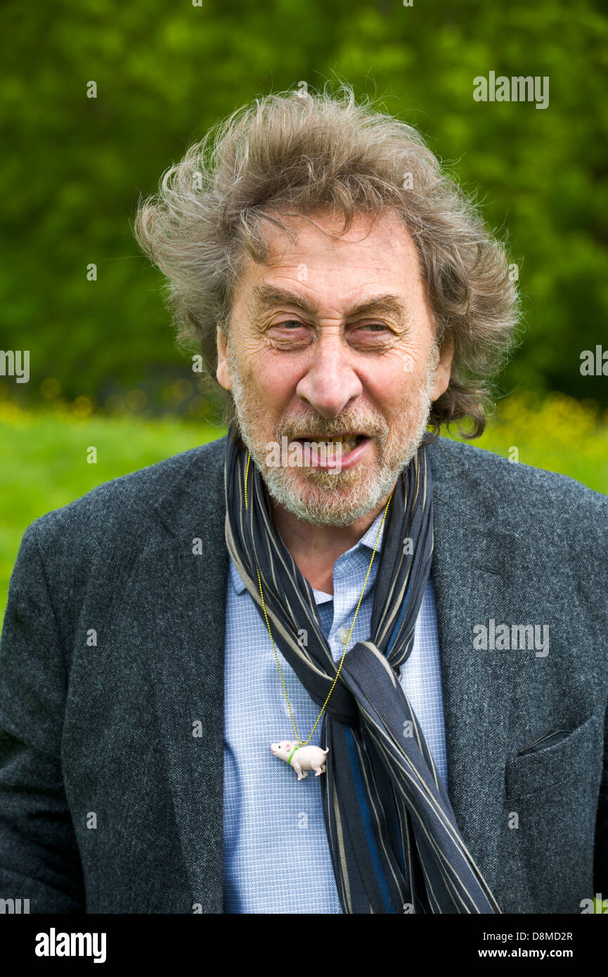 Howard Jacobson with novelty pig that his wife bought him as a present for winning the 2013 Bollinger Everyman Wodehouse Prize for Comic Fiction for his novel 'Zoo Time' pictured at Hay Festival 2013 Hay on Wye Powys Wales UK Stock Photo