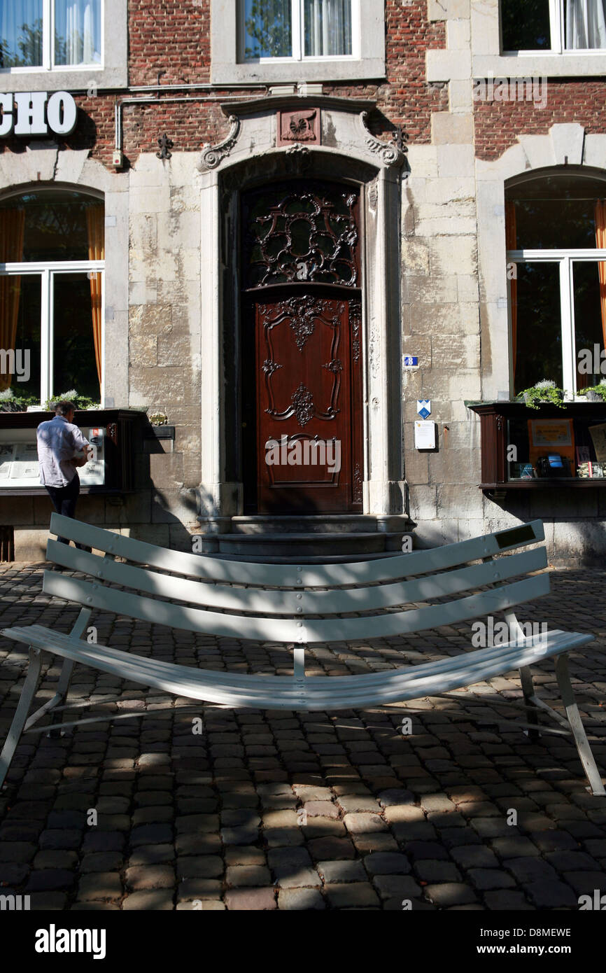 Bench in front of an old building Stock Photo - Alamy