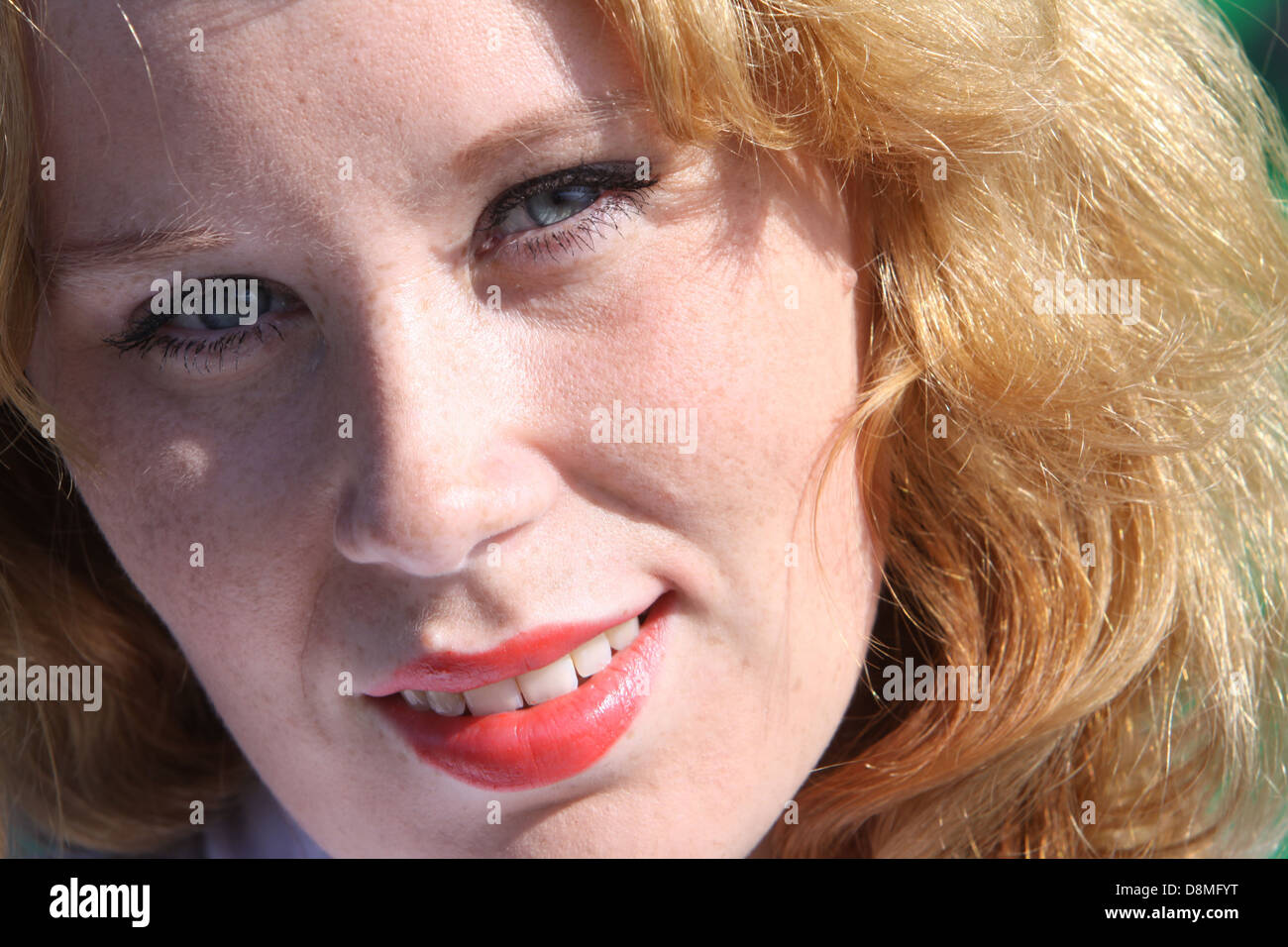 young redheaded woman Stock Photo