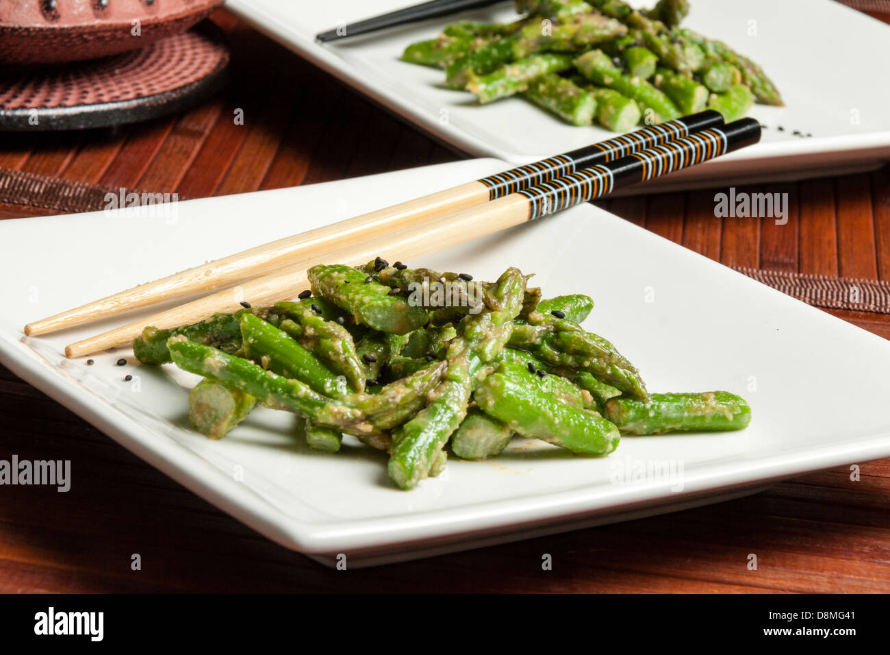 Asparagus Sesame Salad, Japanese style, with Japanese tea pot, horizontal Stock Photo