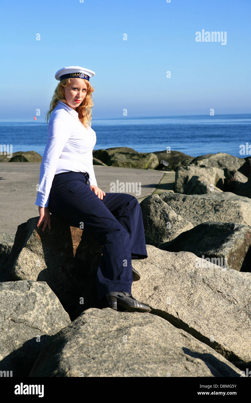 ginger woman in sailor's outfit Stock Photo