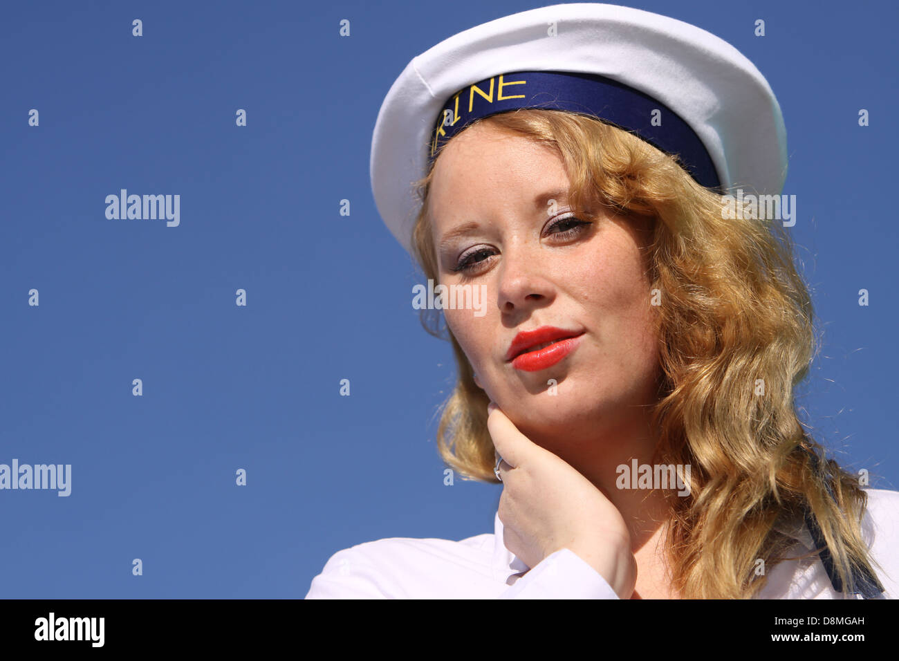 ginger woman in sailor's outfit Stock Photo