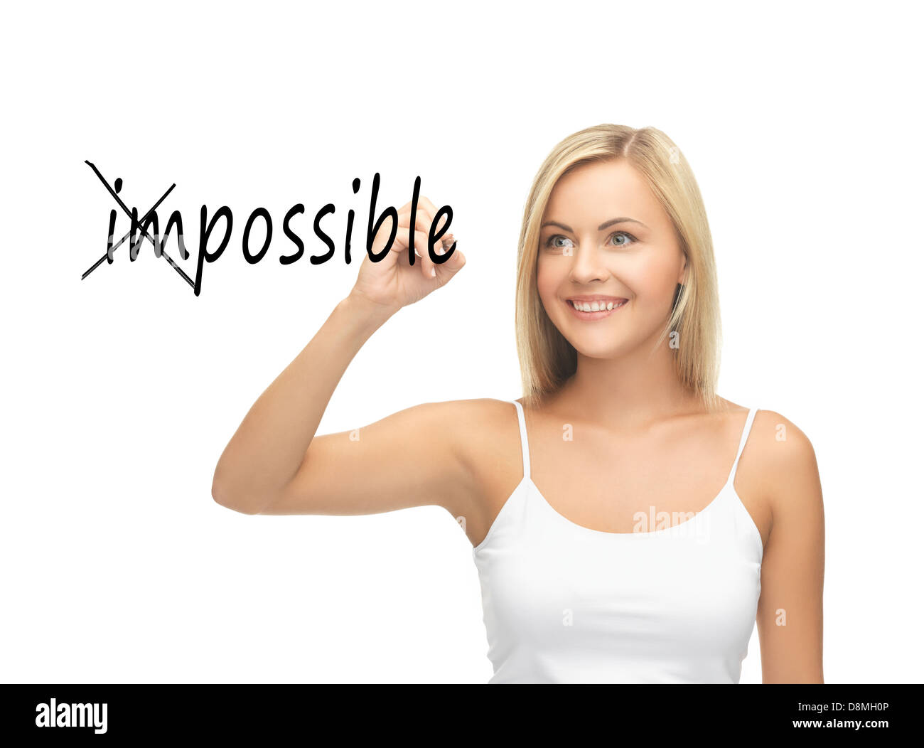 woman writing the word (im)possible in the air Stock Photo
