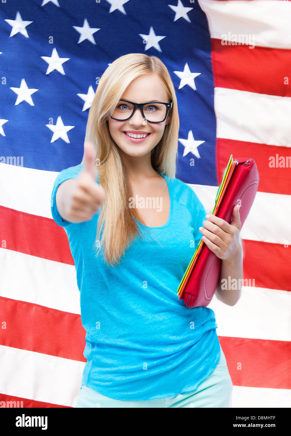 smiling student with folders Stock Photo - Alamy