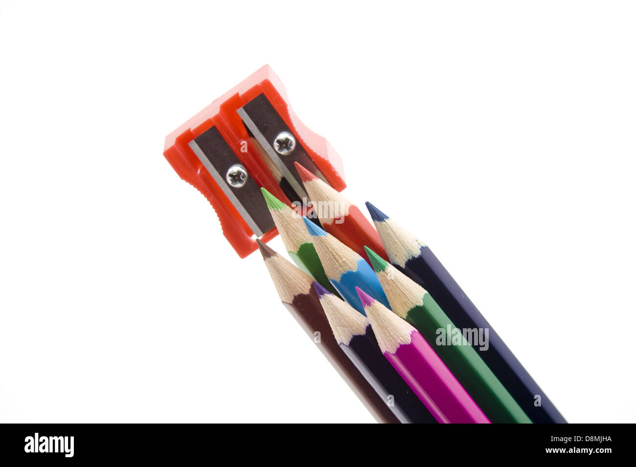 Colored pencils with sharpener Stock Photo Alamy