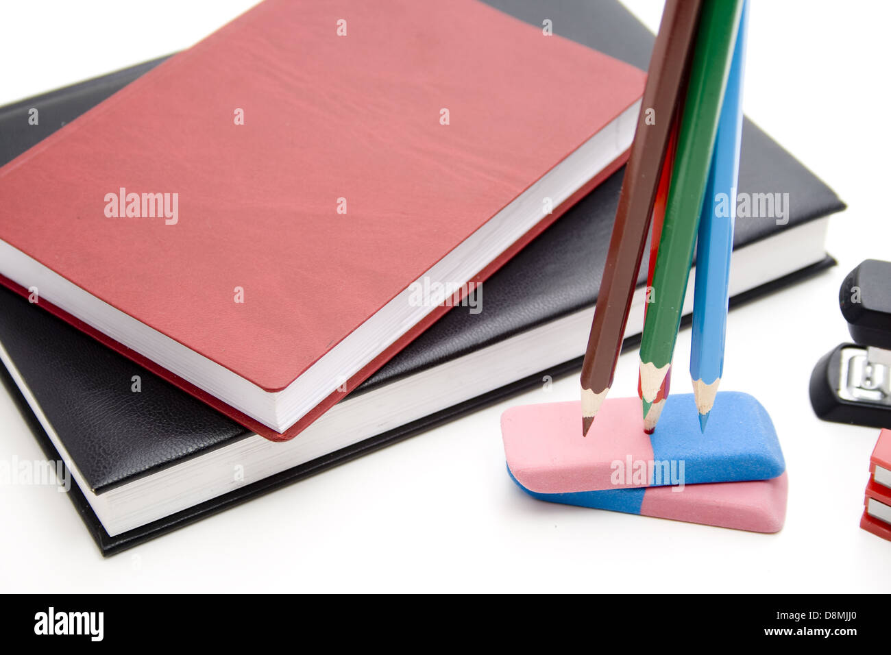 Book with pencils Stock Photo