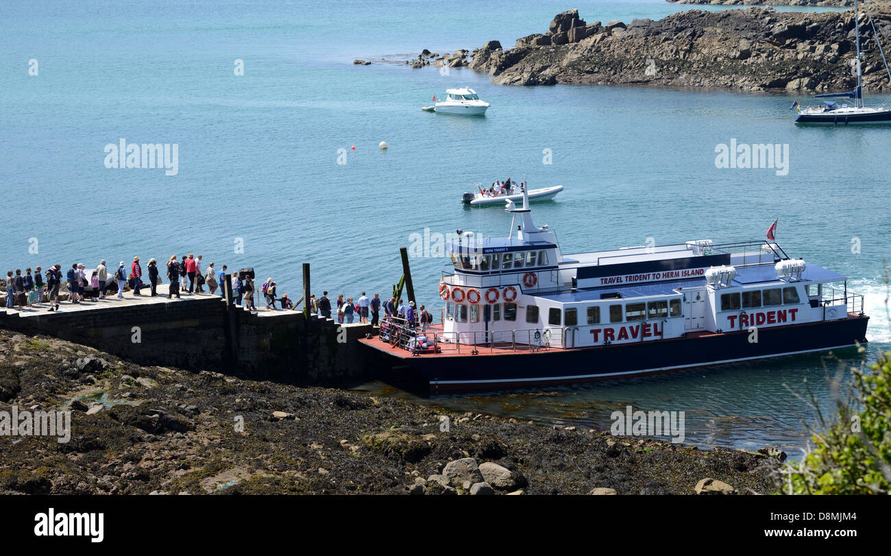 passengers embarking ferry at Herm, Channel Islands, GB Stock Photo