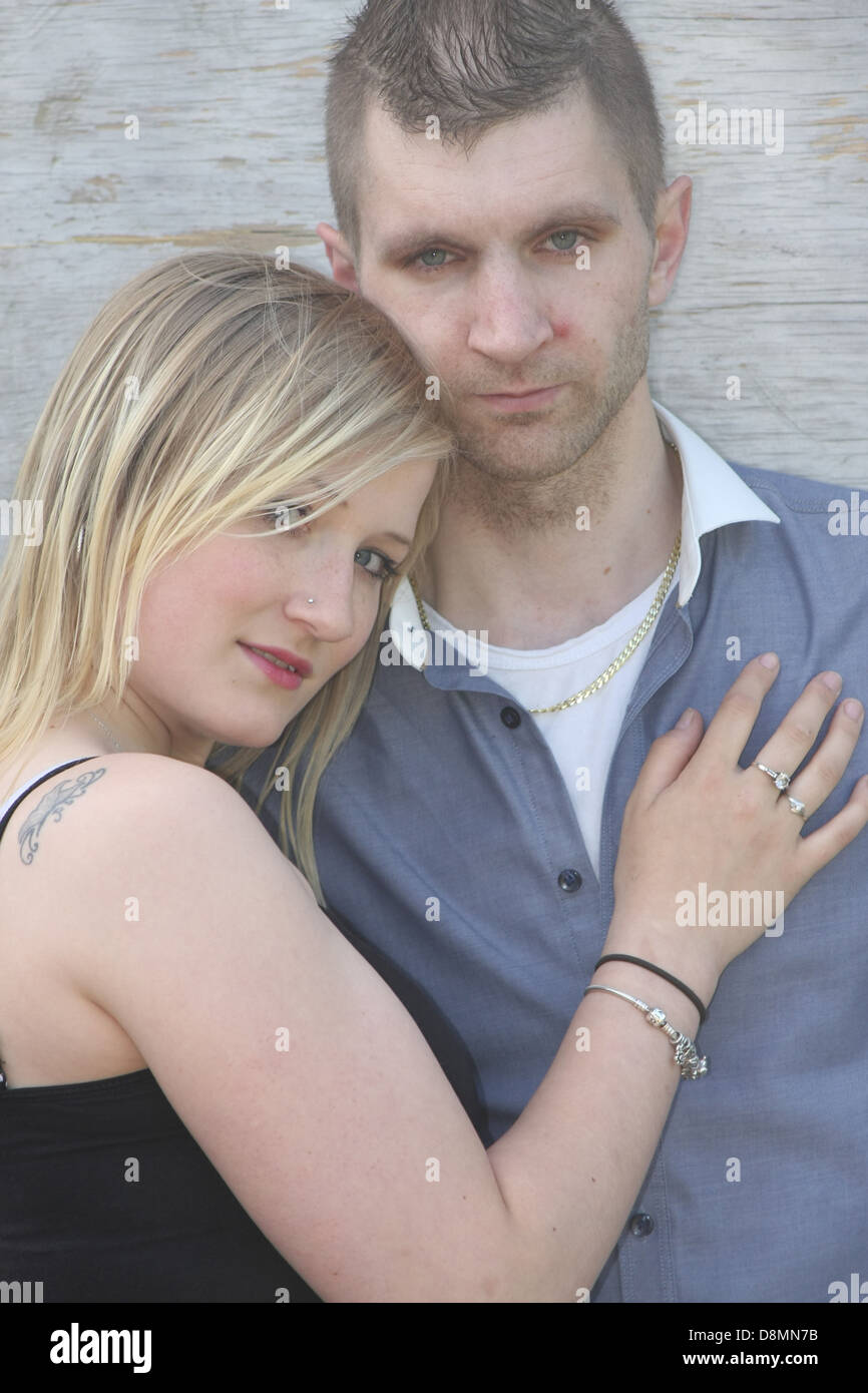 Pair of young rural lovers, she is in her late teens and he is in his twenties, June 2013 Stock Photo