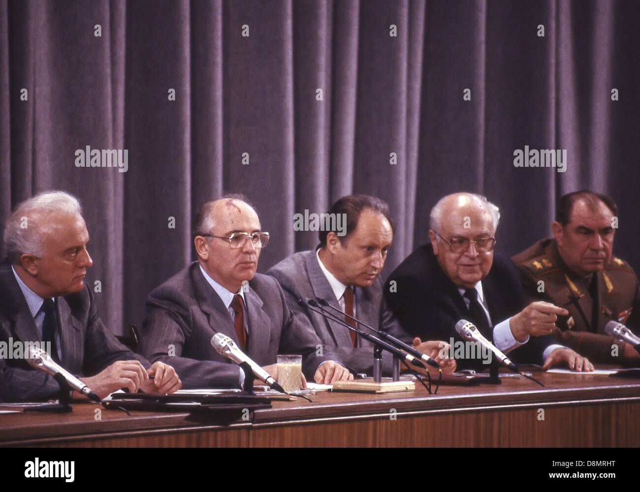 June 3, 1988 - Moscow, RU - Dobrynin points out someone in the audience to Gerasimov as Soviet leader MIKHAIL GORBACHEV answers a question at a press conference during the Moscow Summit. It was the fourth summit meeting between U.S. Pres. RONALD REAGAN and General Secretary of the Communist Party of the Soviet Union Gorbachev, and Reaganâ€™s first trip to Moscow. Held on May 25, 1988-June 3, 1988, Reagan and Gorbachev finalized the Intermediate-Range Nuclear Forces Treaty (INF). On the dais, left to right: EDUARD SHEVARDNADZE, Soviet Minister of Foreign Affairs, Gorbachev, GENNADI GERASIMOV, f Stock Photo