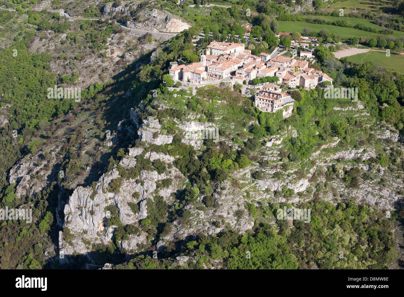 AERIAL VIEW. Perched medieval village. Gourdon, French Riviera's backcountry, France. Stock Photo