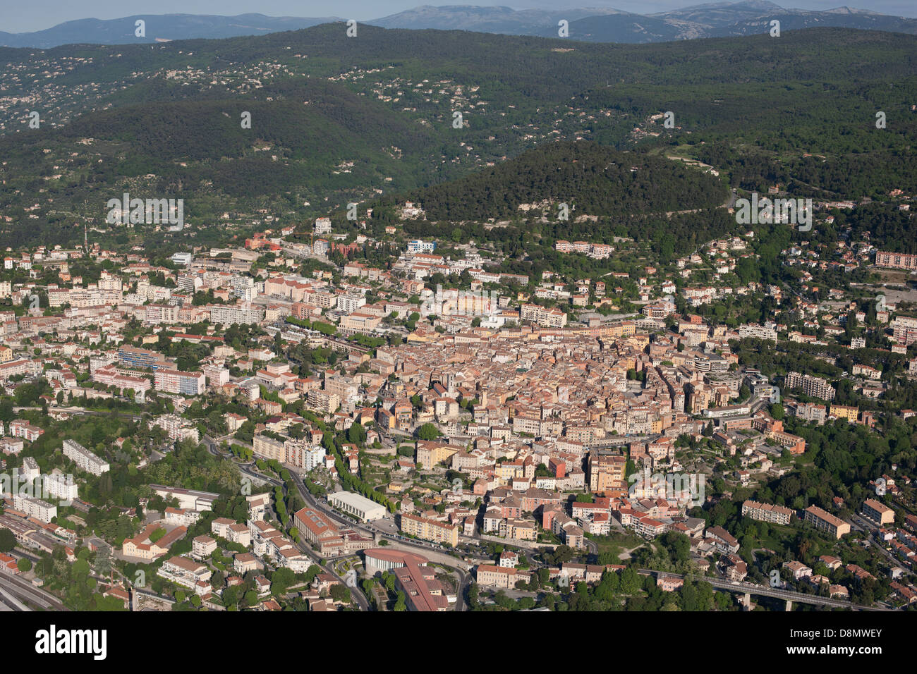 AERIAL VIEW. Hillside town of Grasse. French Riviera's backcountry, France. Stock Photo