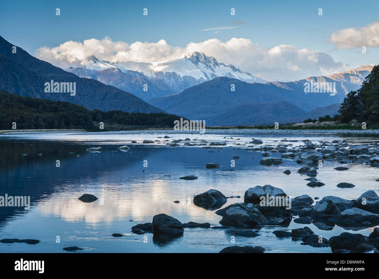 The Haast River at Pleasant Flat with a view of Mount Hooker and Mount McCullaugh in New Zealand's South Island. Stock Photo