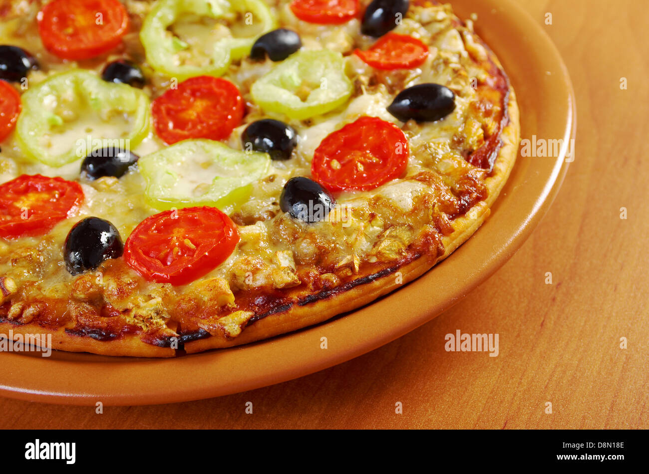 .home pizza with tomato and eggplant Stock Photo