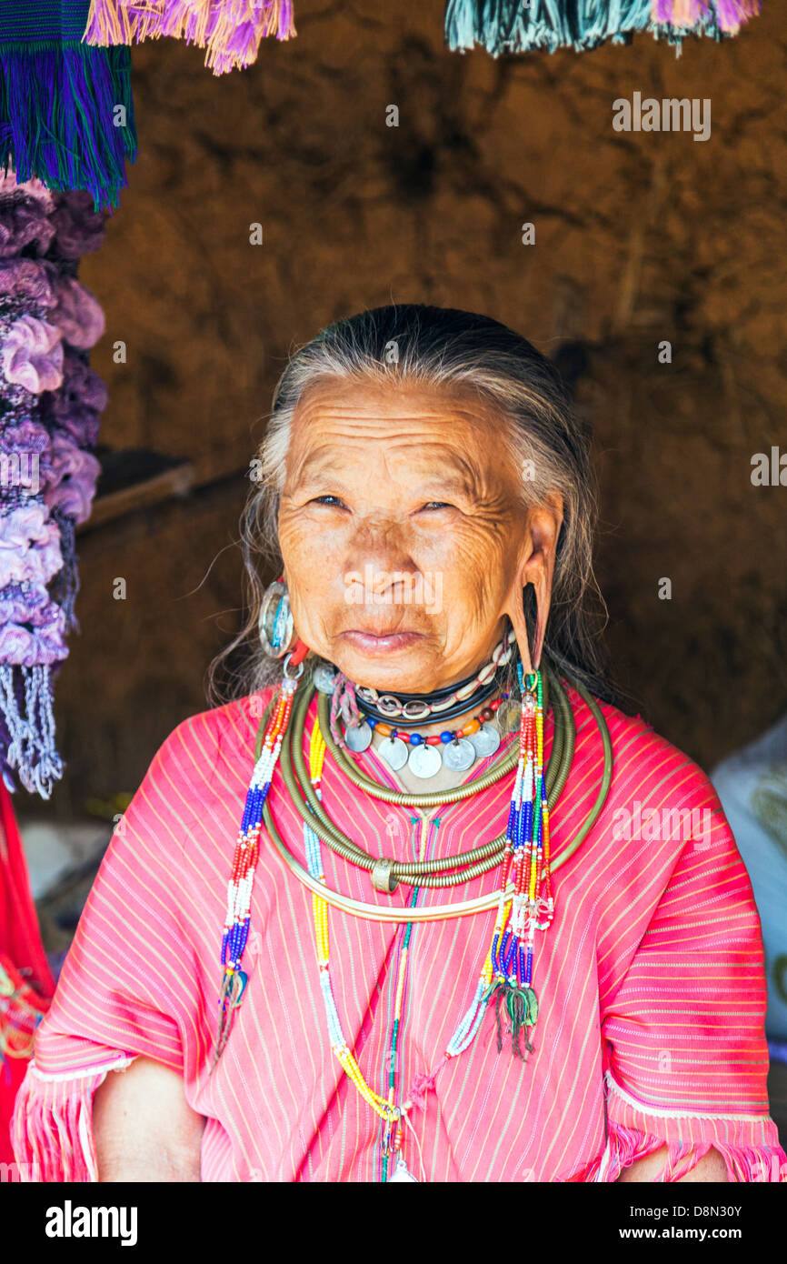 Karen Padong tribeswoman in a village near Chiang Rai, northern Thailand, an elderly Burmese refugee from Myanmar Stock Photo