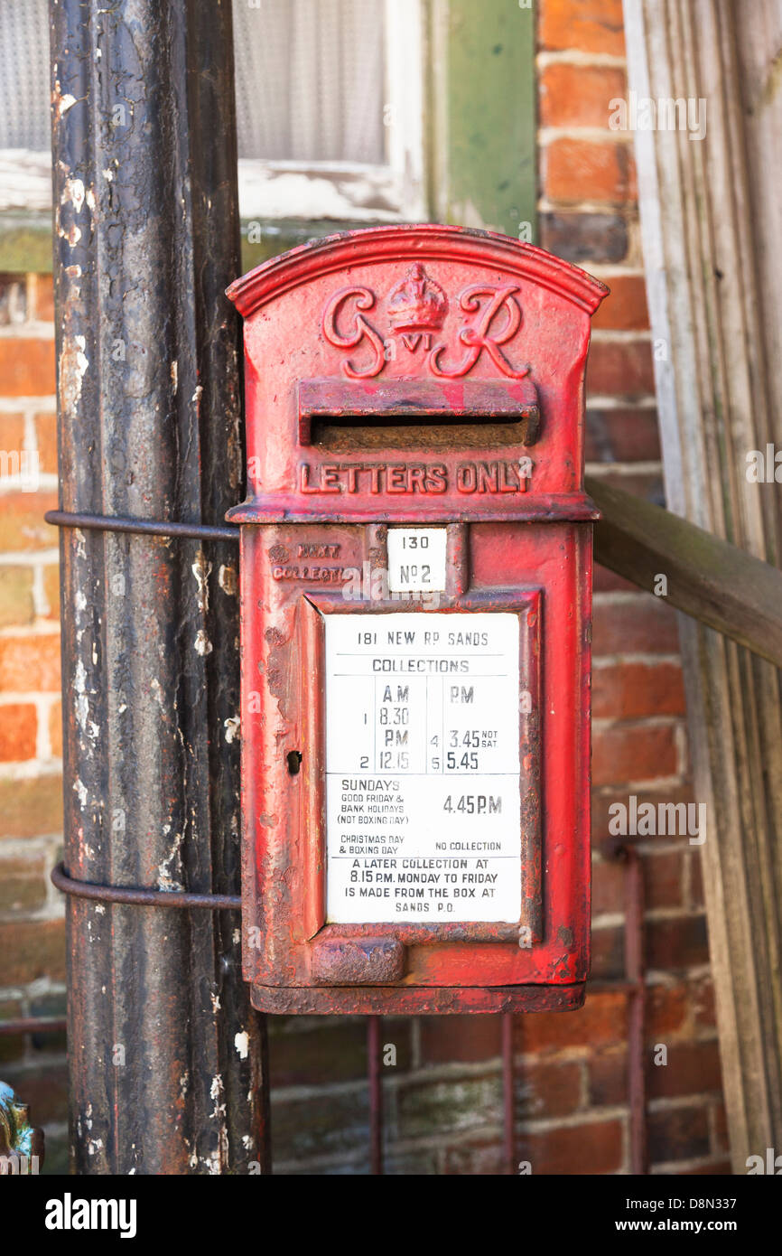 Vintage King George VI GR red post box attached to a lamppost Stock Photo