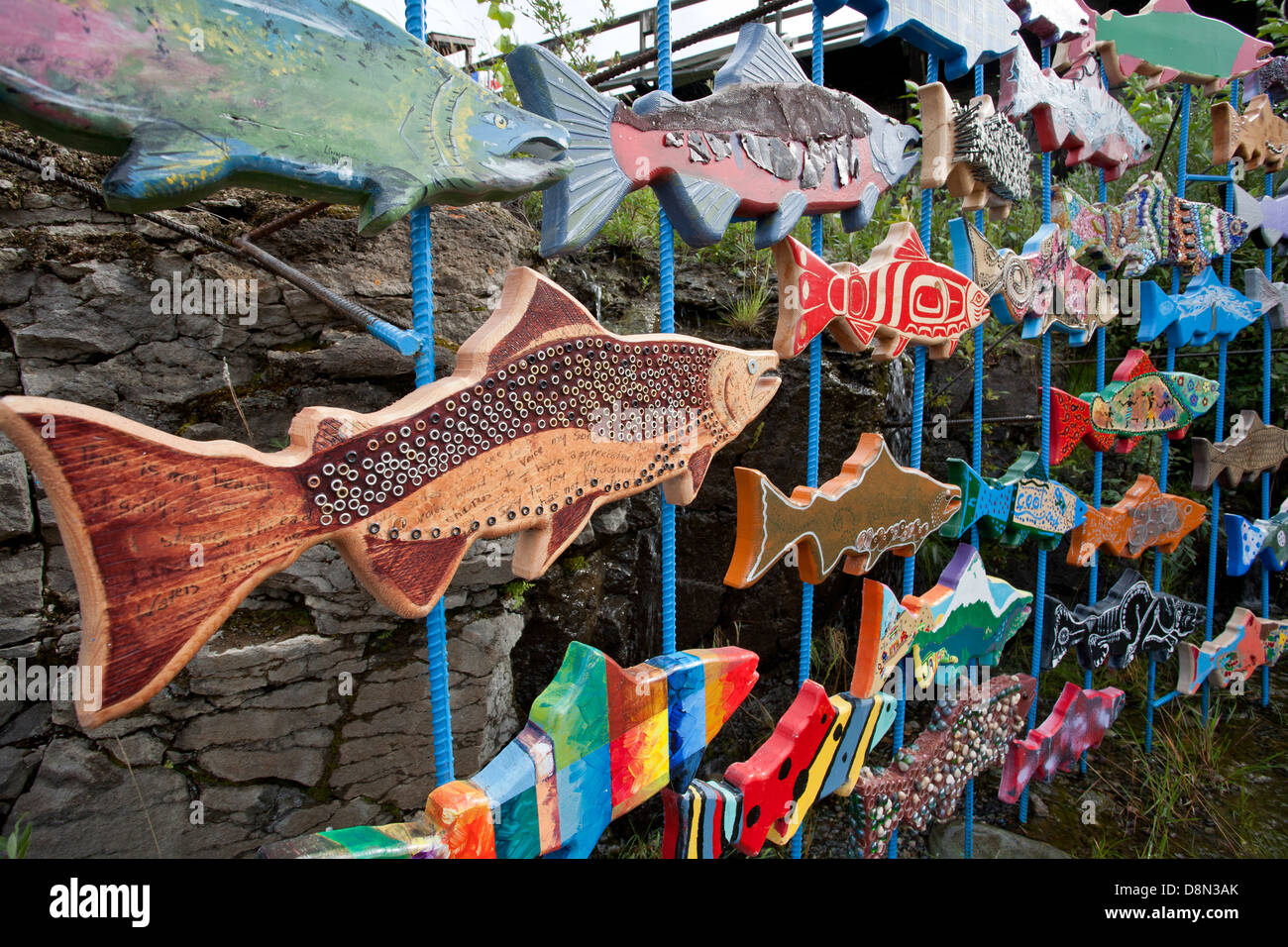 Public art installation. Colorful salmons. Whitehorse Rapids Fishway. Yukon. Canada Stock Photo