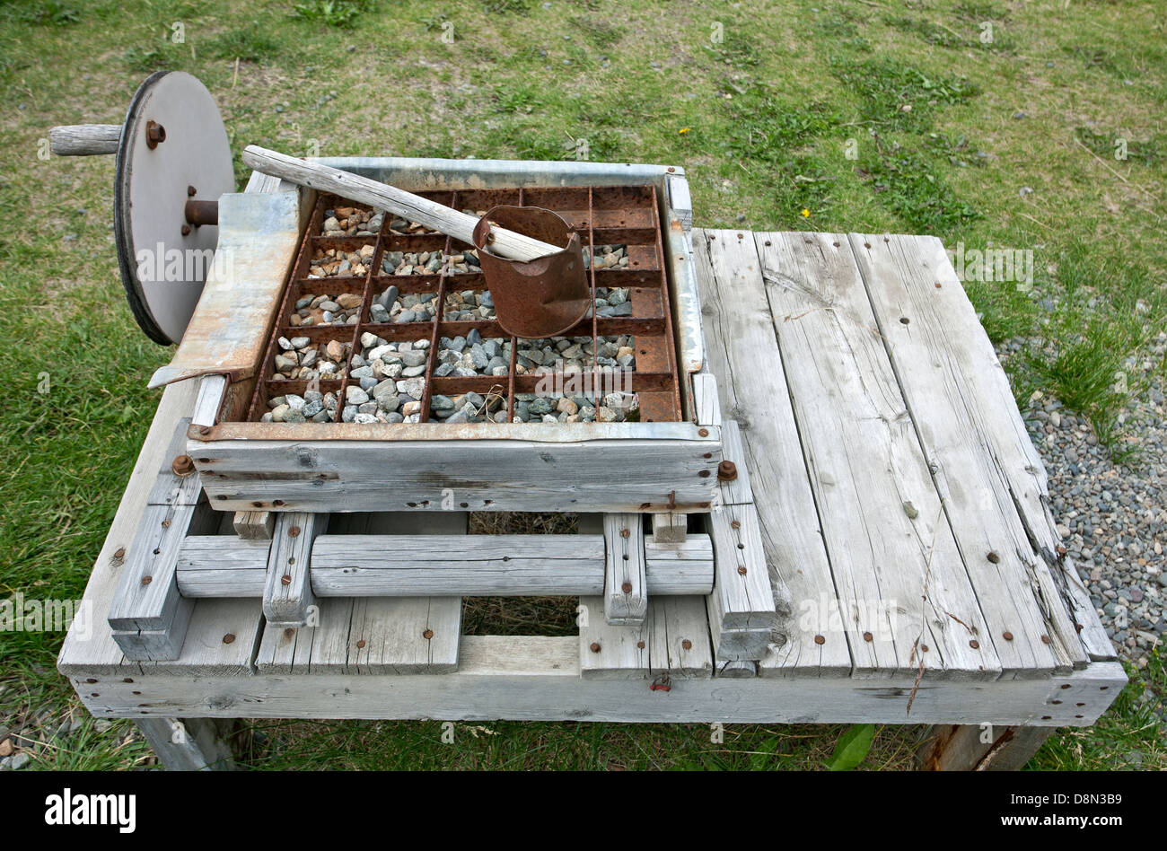 Rocker box used to separate the gold from the gravel. MacBride Museum of Yukon History. Whitehorse. Canada Stock Photo