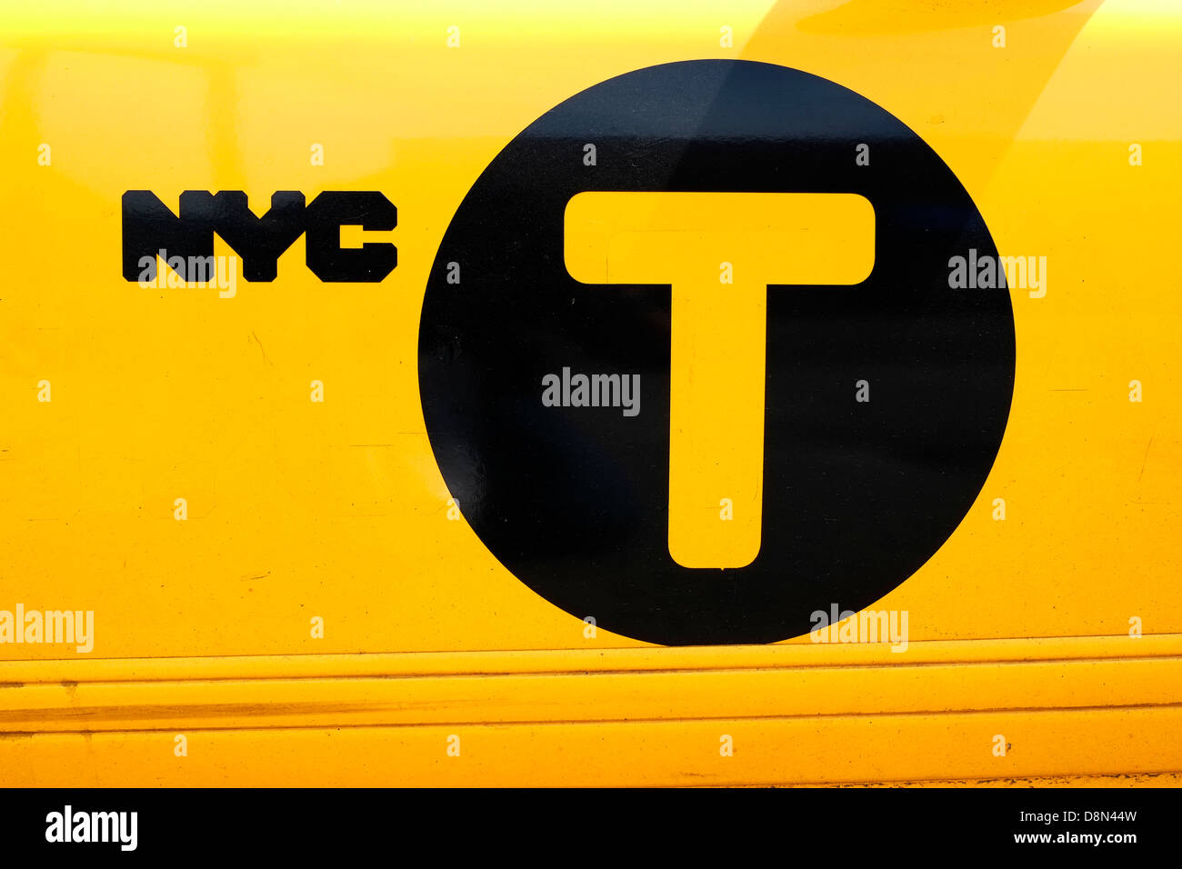 Graphics on the door of a New York City yellow taxi cab. Stock Photo
