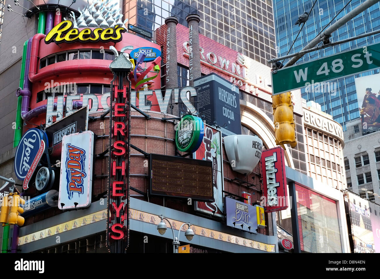 Corporate billboards on the side of a building in Times Square, New York City. Stock Photo