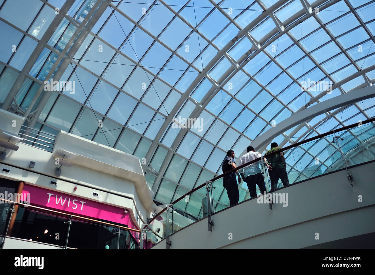 Detail of modern shopping mall in Istanbul, Turkey with three people below glass roof Stock Photo