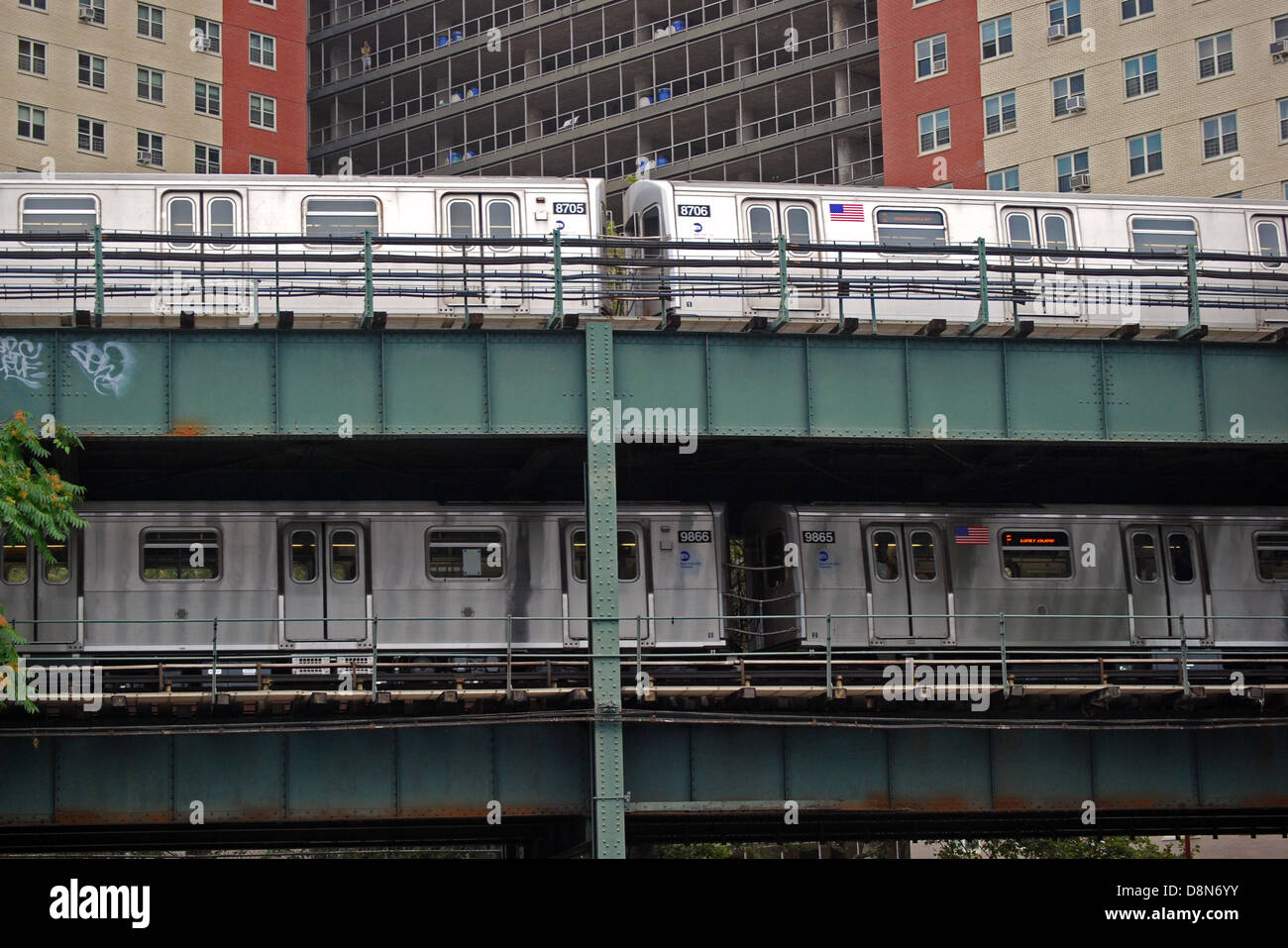 Two elevated subway trains in the Coney Island section of Brooklyn, New