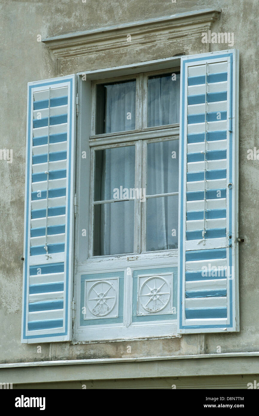 French decorated window with shutters Stock Photo - Alamy