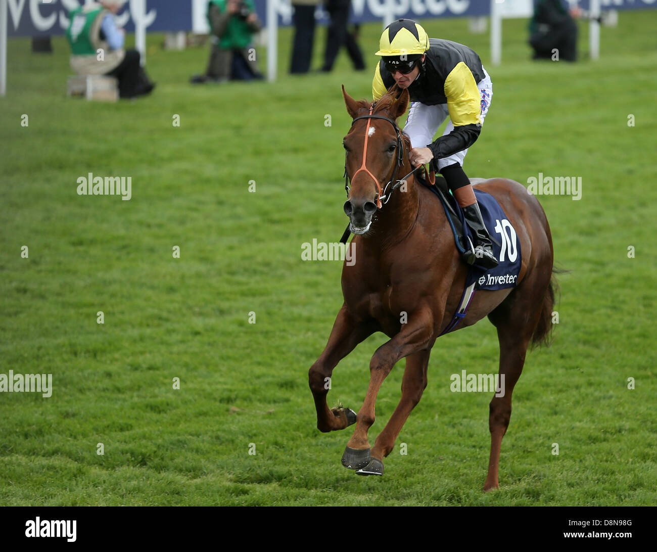 Epsom Downs, Surrey, UK. 1st June 2013.   Richard Hughes rides 'Thunderstrike' to win the Investec Woodcote Stakes on The Investec Derby Day from Epsom Racecourse. Credit:  Action Plus Sports Images/Alamy Live News Stock Photo