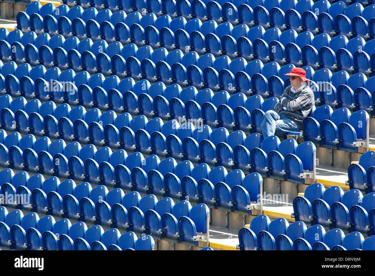 cardiff-wales-june-01-a-fan-sits-alone-in-an-empty-stand-during-the-D8N9JM.jpg